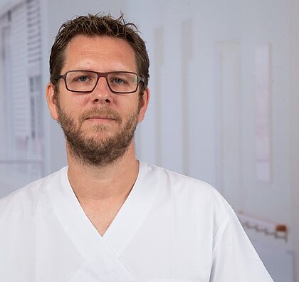 Portraitfoto Marco Renth Dr. med. Marco Renth