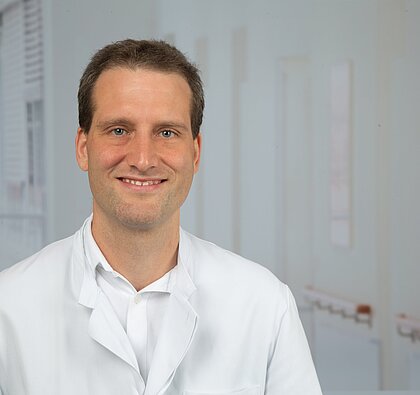 Dr. med. Marcel Féchir