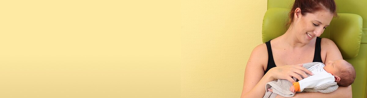 Mutter mit Baby im Arm