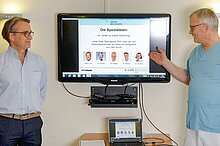 Dr. Meister ud Dr. Krieger bei der Patientenschulung